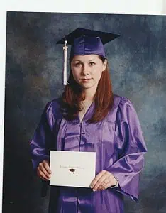 Mandy at age 15 in her high school graduation photo