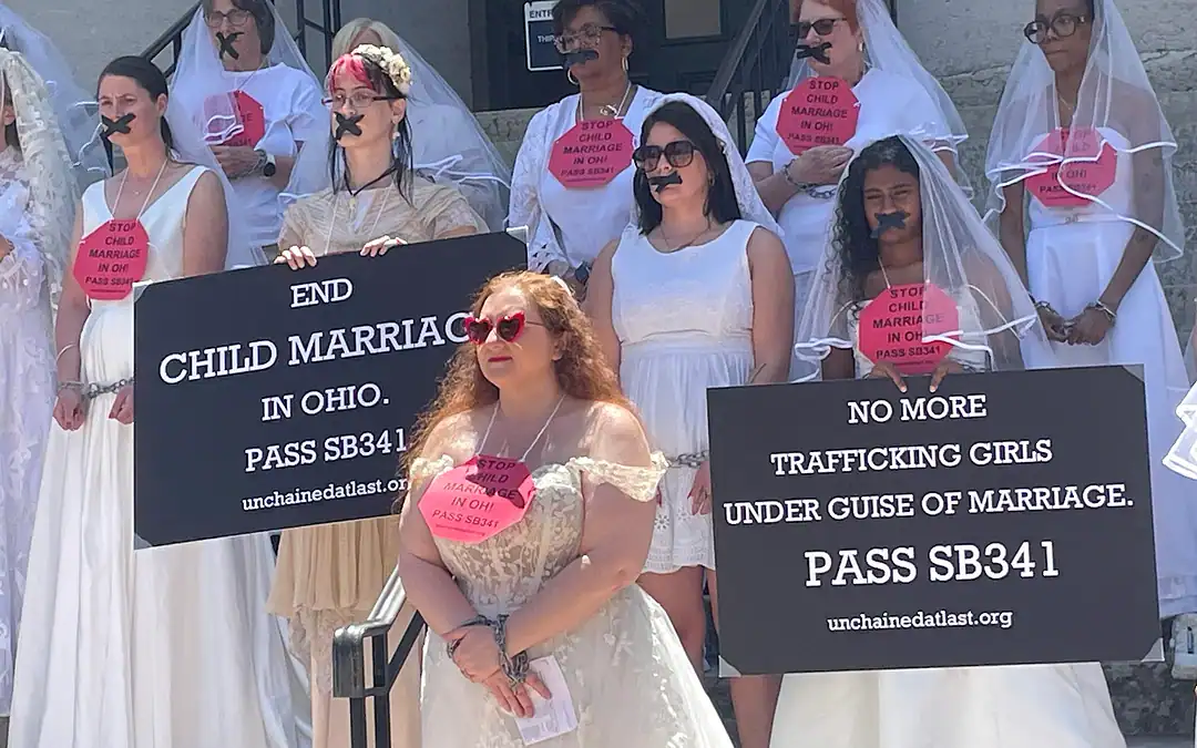 Bridal gowns and chains: We protested in Columbus